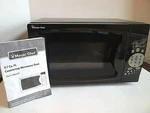 Magic Chef 0.7 Cu Ft 700 Watt Countertop Microwave MCM770B1 Black W/users Manual. Fixed Price $49.50.