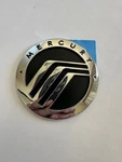 Mercury Car Emblem. Approximately 2-5/8'' Diam. New Old Stock. Fixed Price $25.00.