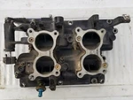 Johnson Evinrude Intake Manifold 0397075 With Reeds 0389823. Fixed Price $99.99.