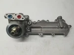 Yanmar 119770-00692 119770-00651 6LPA STP2 Oil Cooler And Cover Assembly. Fixed Price $700.00.