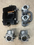 Used Yamaha C40HP, 2-CYLINDER Carb Assy. Part #649-14301-02-00 & 6E9-14302-02-00. Fixed Price $395.00.
