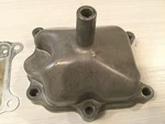 2005 Honda 8HP 9.9HP Exhaust Chamber Cover 18231-ZW9-000 18233-ZW9-003. Fixed Price $18.09.