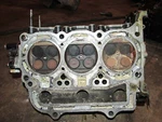 Suzuki DF50 50HP Outboard Cylinder Head (11100-87J02-019). Fixed Price $150.00.