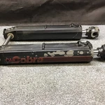 Omc Cobra Stern Drive Tilt Trim Cylinders (PAIR)985660 With Pivot Pin Freshwater. Fixed Price $95.00.